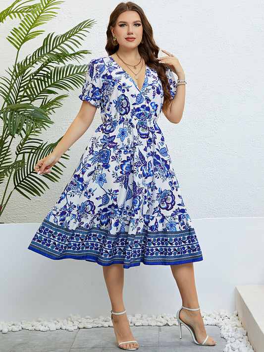 Robe midi fleurie à col en V signée Amélie Morin