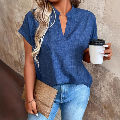 Blouse élégante Amelie Morin à col V cranté et manches chauve-souris