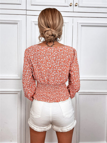 Haut chic à manches longues et col en V à imprimé floral par Amélie Morin