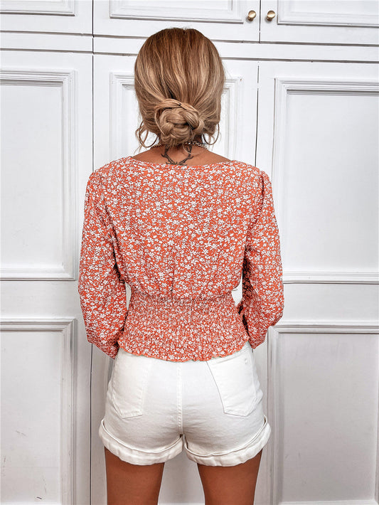 Haut chic à manches longues et col en V à imprimé floral par Amélie Morin