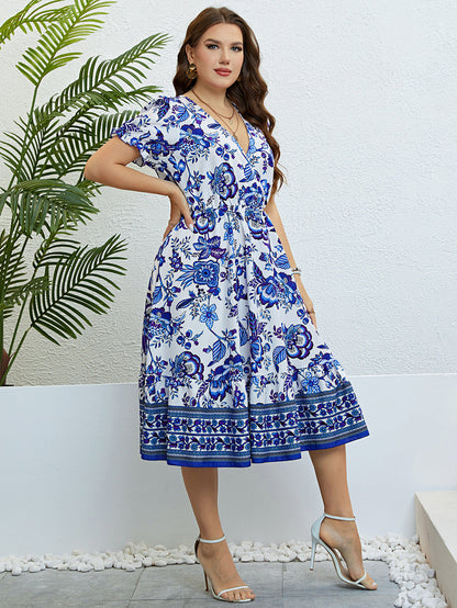 Robe midi fleurie à col en V signée Amélie Morin