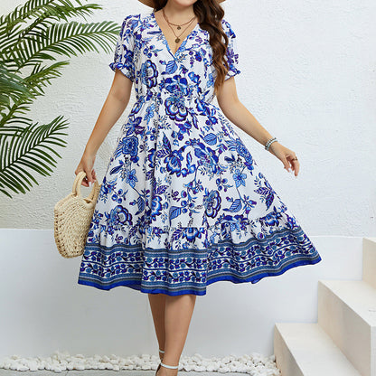Robe midi fleurie à col en V signée Amélie Morin