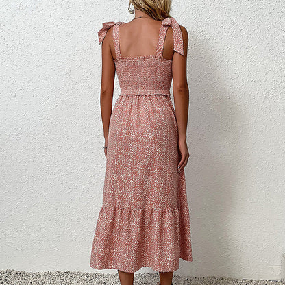 Robe midi dos nu à fleurs par Amélie Morin