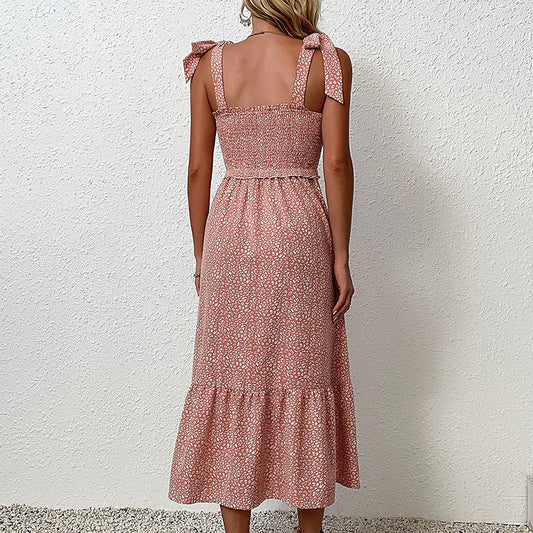 Robe midi dos nu à fleurs par Amélie Morin