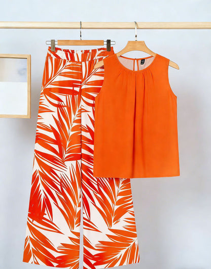 Ensemble deux pièces imprimé tendance pour femme : débardeur asymétrique sans manches et pantalon.