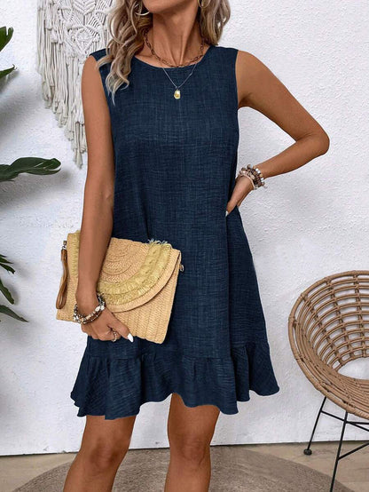 Robe d'été sans manches à volants signée Amélie Morin