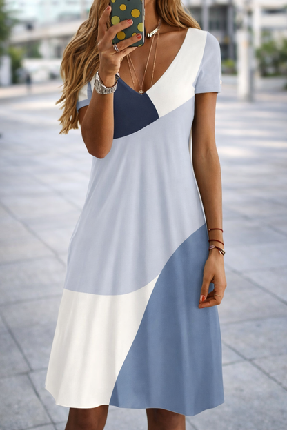 Robe chic à col en V grande taille signée Amélie Morin