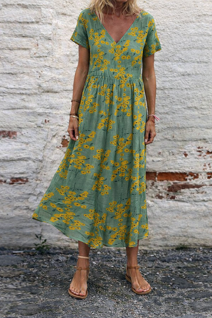 Robe longue maxi en coton à col V et imprimé floral, signée Amélie Morin