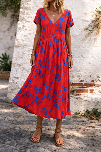 Robe longue maxi en coton à col V et imprimé floral, signée Amélie Morin