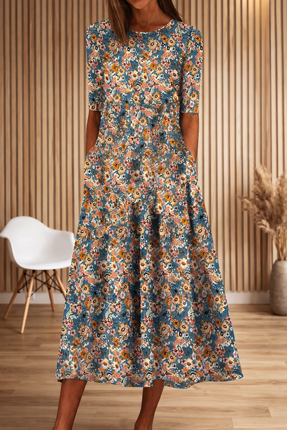 Robe à col rond imprimée de fleurs par Amélie Morin