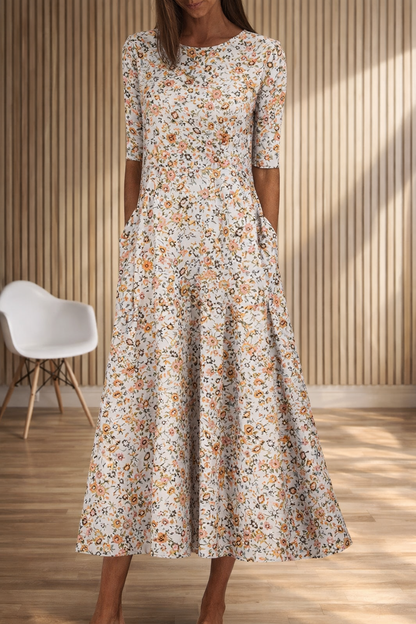 Robe à col rond imprimée de fleurs par Amélie Morin