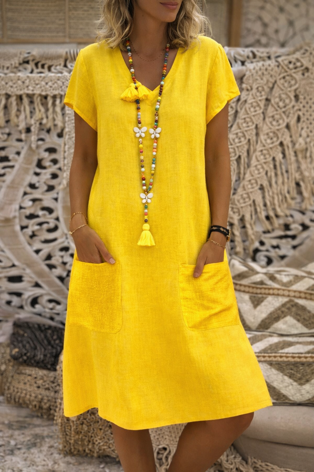 Robe midi chic à poches signée Amélie Morin