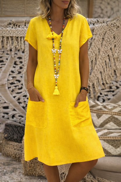 Robe midi chic à poches signée Amélie Morin