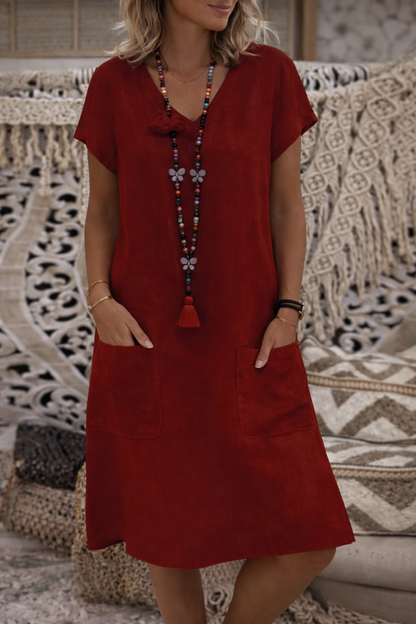 Robe midi chic à poches signée Amélie Morin