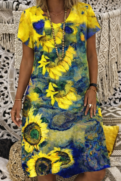 Robe midi fleurie à col en V signée Amélie Morin