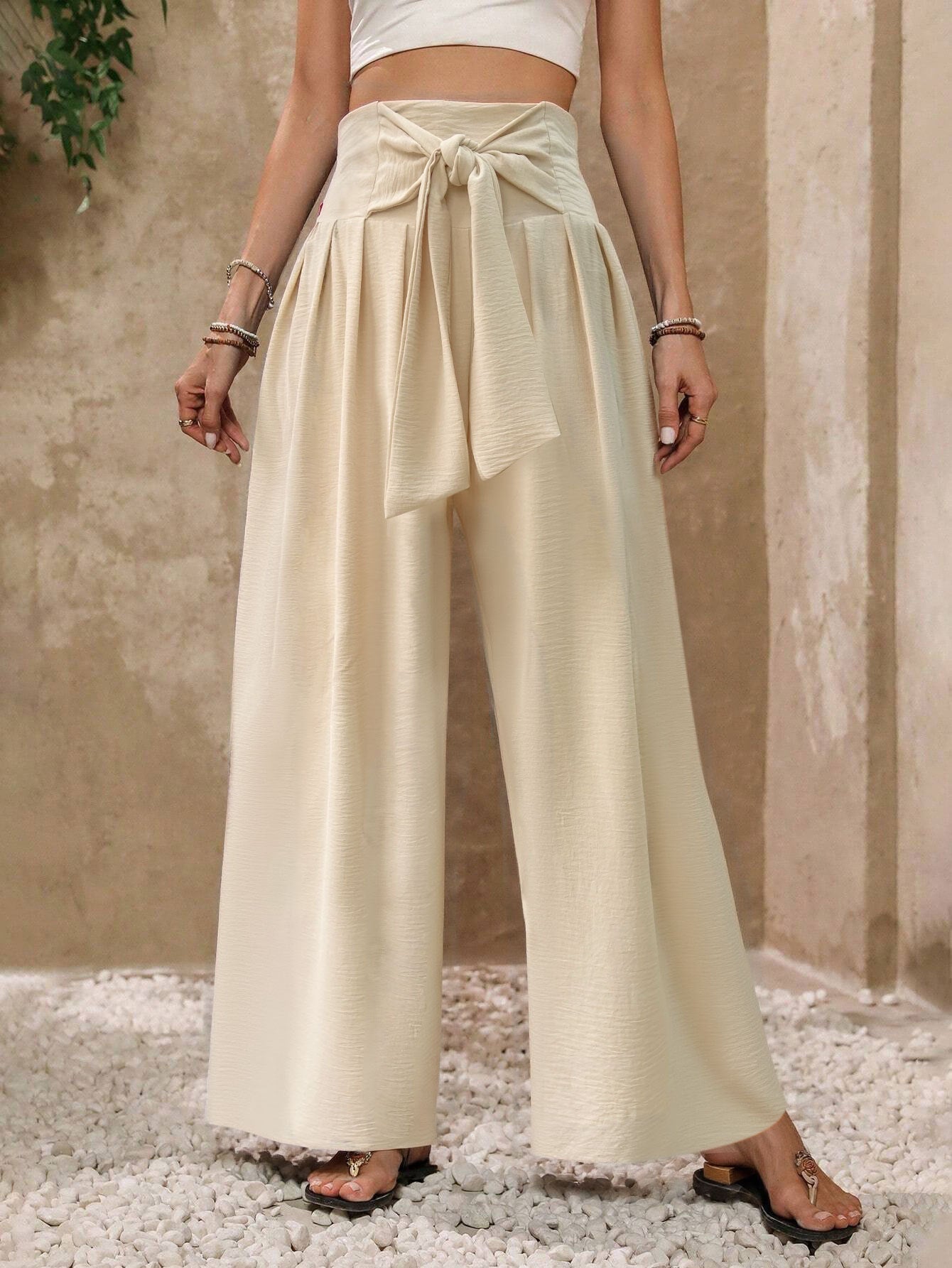 Pantalon ample fluide à taille haute et ceinture à nouer sur le devant, couleur unie, pour femme