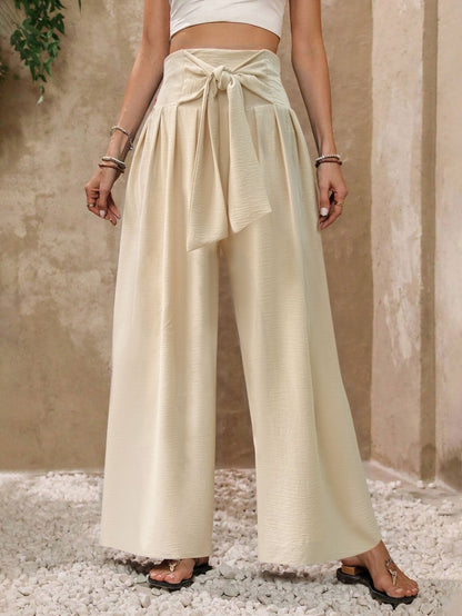 Pantalon ample fluide à taille haute et ceinture à nouer sur le devant, couleur unie, pour femme