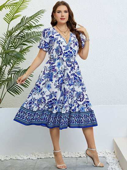 Robe midi fleurie à col en V signée Amélie Morin