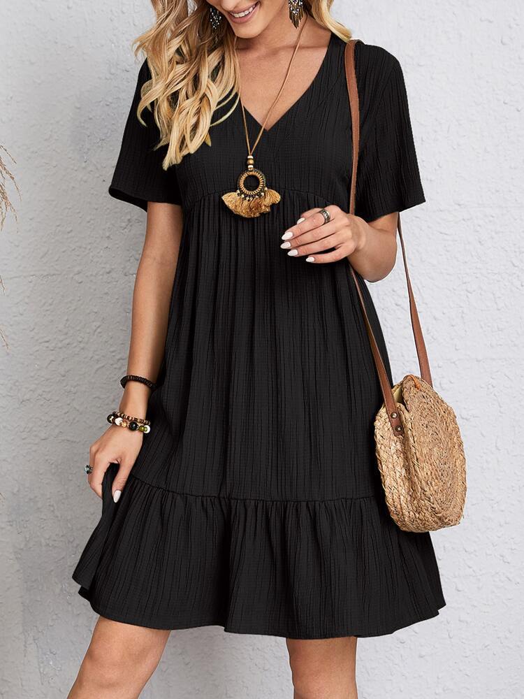 Robe d'été chic à col en V signée Amélie Morin