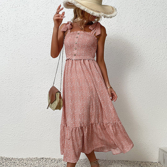 Robe midi dos nu à fleurs par Amélie Morin