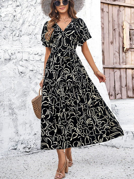 Robe midi à manches courtes géométrique chic Amelie Morin