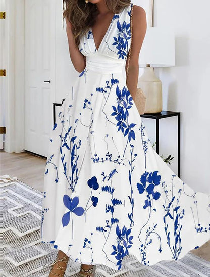 Robe fleurie à col V et taille haute signée Amélie Morin