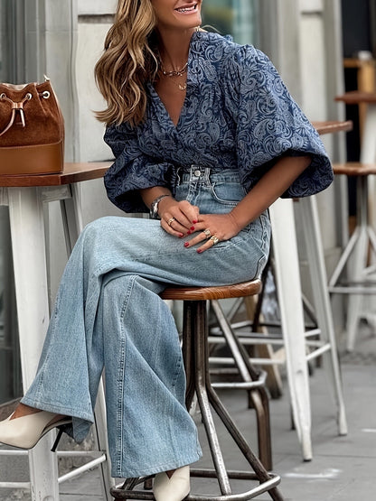 Blouse élégante à manches bouffantes signée Amélie Morin